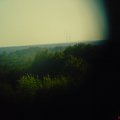 Piece i kominy KWB Bełchatów z Góry Sławno pod Opocznem - zdjęcie wykonane przez lornetkę, gołym okiem widoczna była jedynie Góra Kamieńsk #Bełchatów #kopalnia #kominy #GóraSławno #panorama #Łódzkie #WzgórzaOpoczyńskie