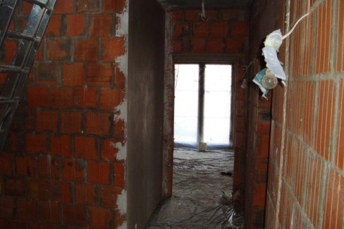 Kwiecień 2009 - pierwsze ściany po tynkowaniu - korytarz #Kornelia #budowa